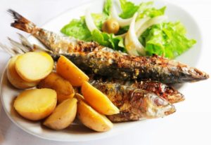 grilled sardines - traditional portuguese dish